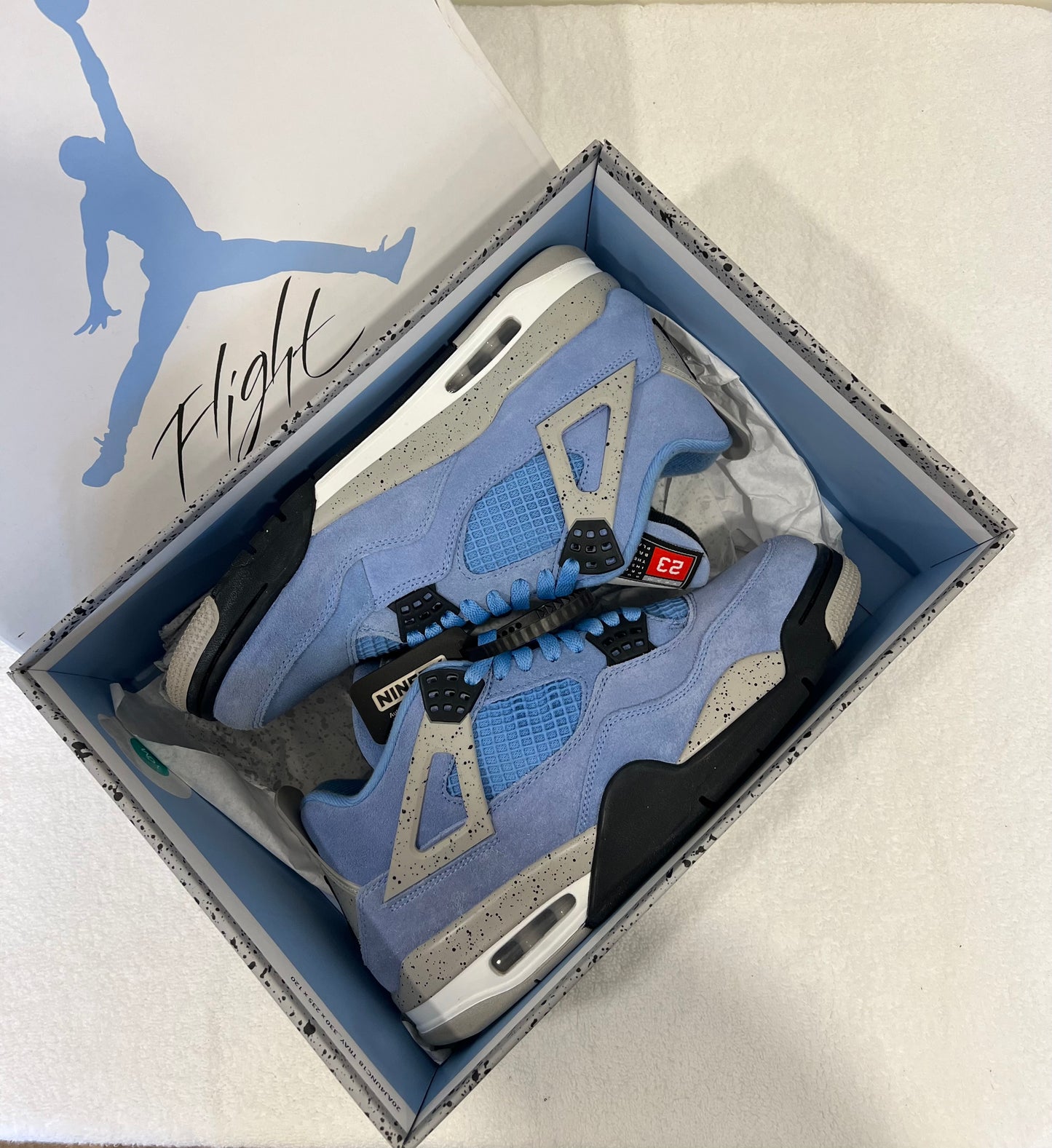 Jordan 4 University Blue