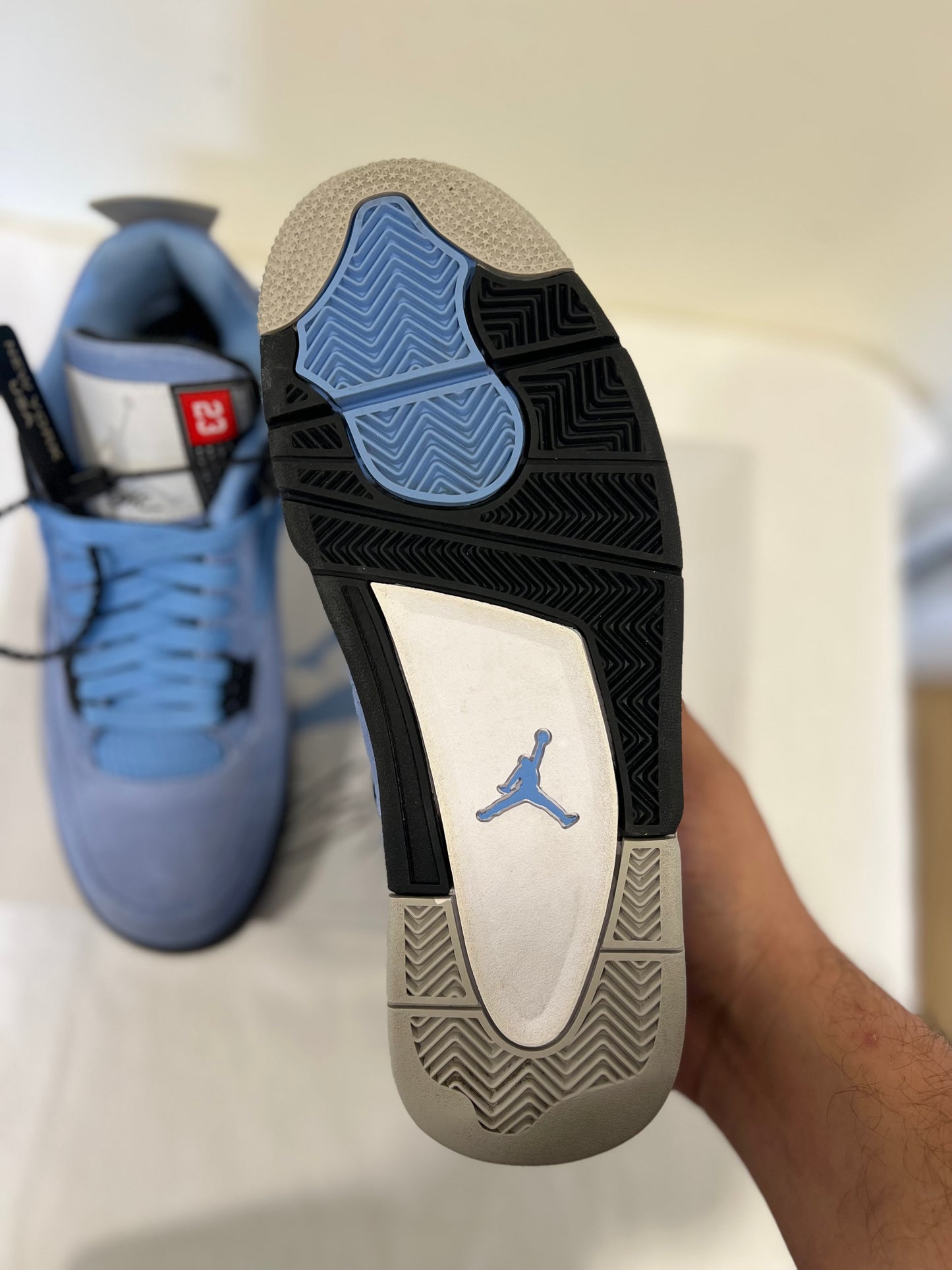 Jordan 4 University Blue